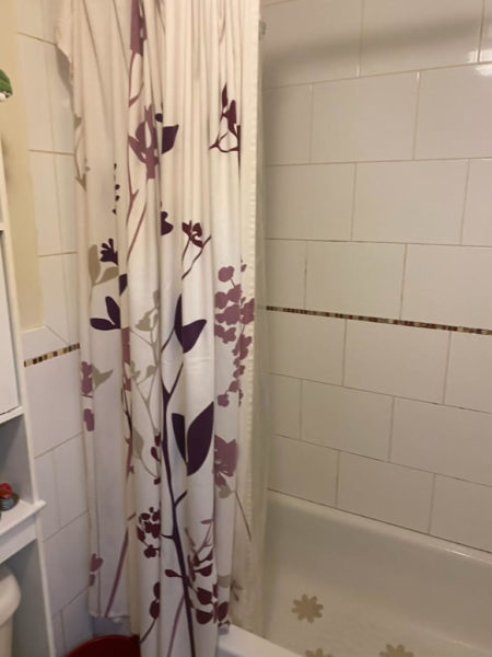 inside shower of 7,600 square foot renovated building for sale