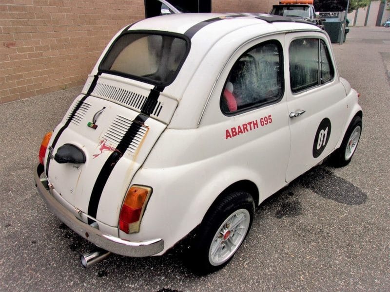 Angled backside view of Abarth automobile up for auction at Maltz Auctions