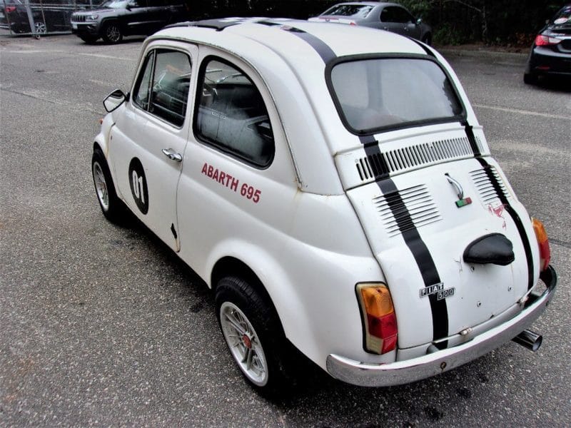 Angled backside view of Fiat automobile up for auction at Maltz Auctions