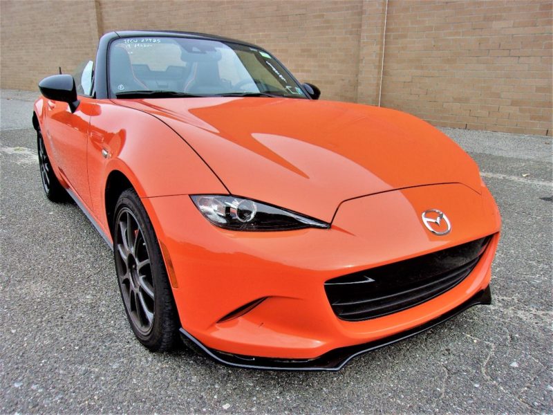 Front side of orange Mazda - find at an auction near you