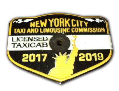 new york city taxi limousine commission medallion for sale at maltz auctions