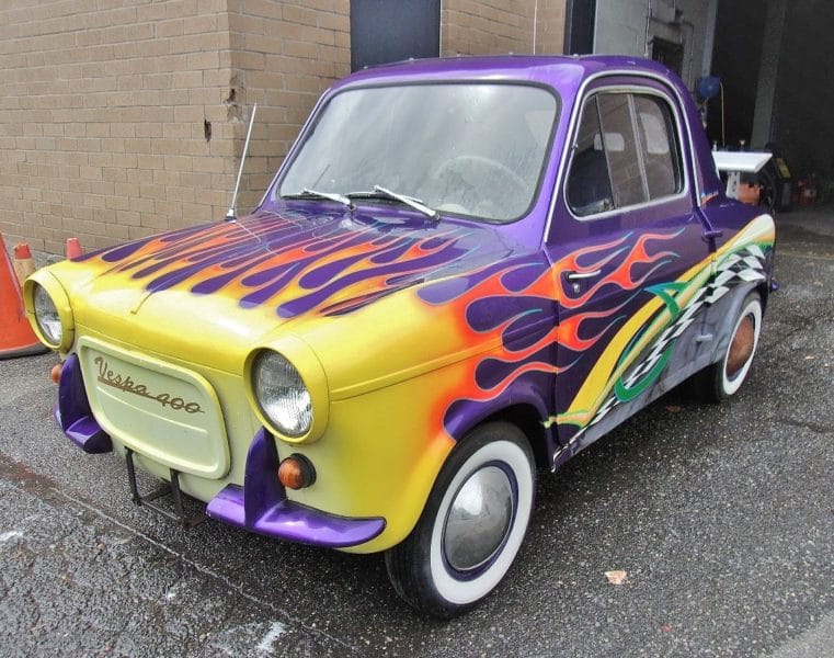 Angled side view of purple flamed vehicle - buy at Maltz Auctions in New York