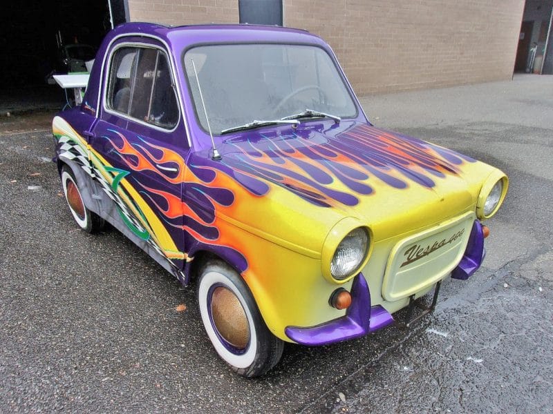 front view of purple flamed car up for auction at maltz auctions