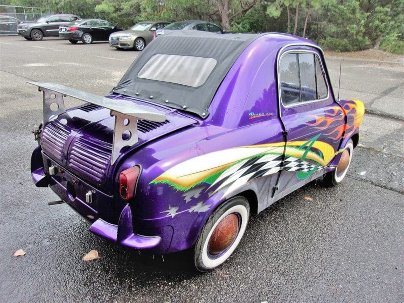 Angled view of purple flamed car - buy at Maltz Auctions