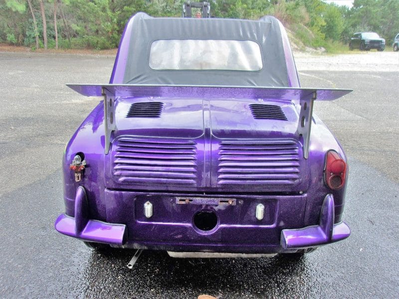 Back view of purple flamed automobile - buy at Maltz Auctions