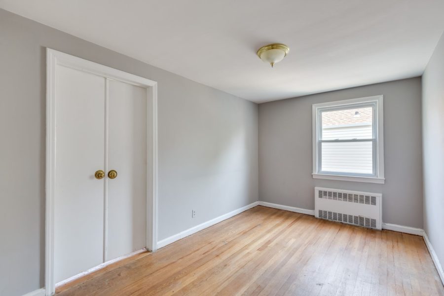 empty bedroom of 4 bedroom home for sale at maltz auctions