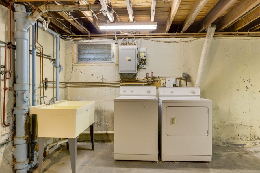 laundry and dryer in basement of 3 bedroom home for sale at maltz auctions