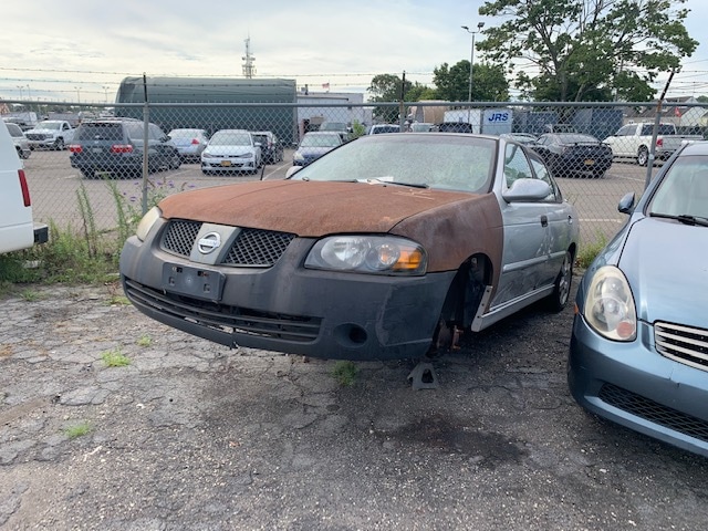 Buy rusted Nissan car at auto auction at Maltz Auctions in NYC, New York