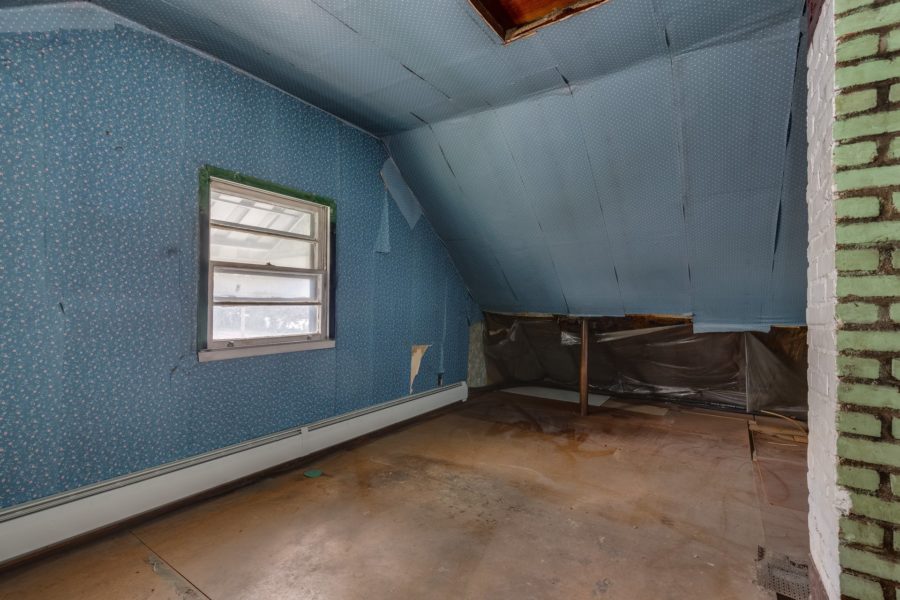 inside attic of property for sale at Maltz Auctions