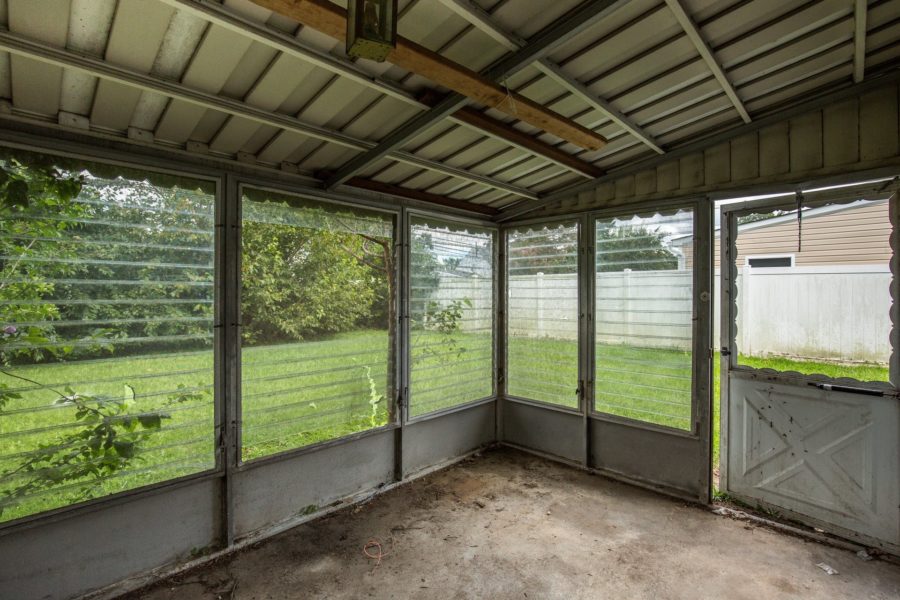 indoor porch on property for sale at Maltz Auctions
