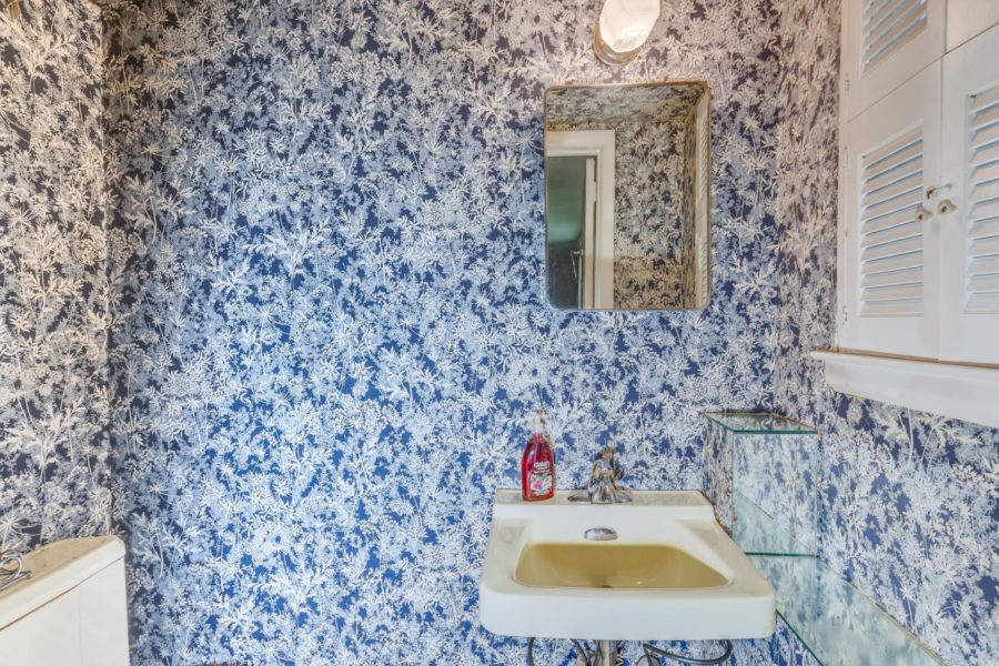bathroom sink and mirror of property up for sale at Maltz Auctions