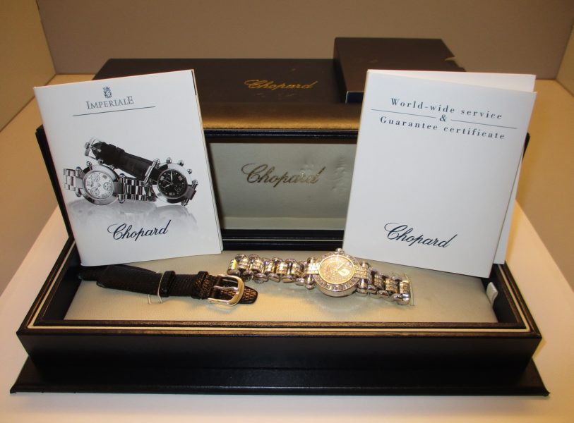 luxury watches in box with pamphlets for sale at maltz jewelry auctions
