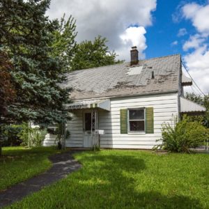 4 BR Handyman Special front of home for sale at Maltz Auctions in New York