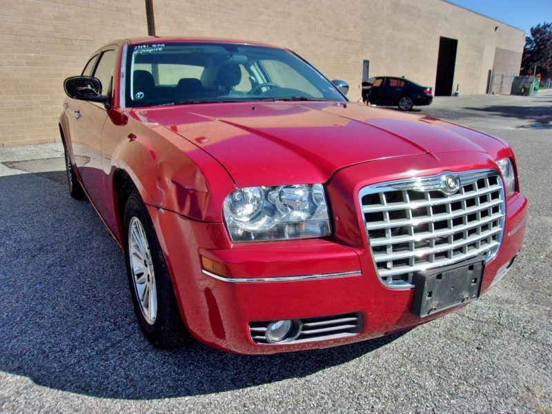 red vehicle for sale at maltz auto auctions in new york city