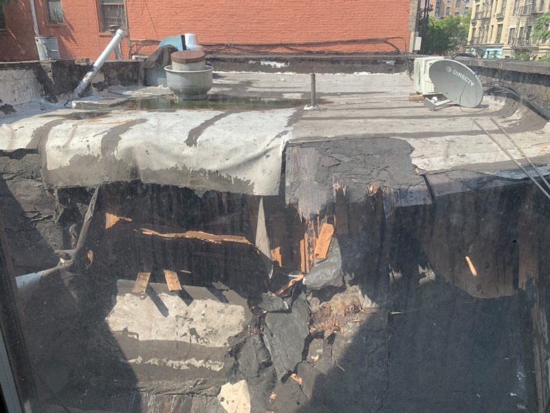damaged top half of mixed use building for sale by maltz auctions