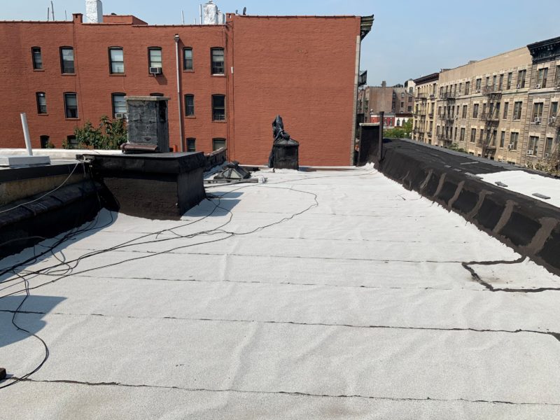 roof of mixed use building for sale by maltz auctions