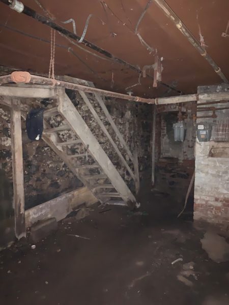 interior basement of mixed use building for sale by maltz auctions