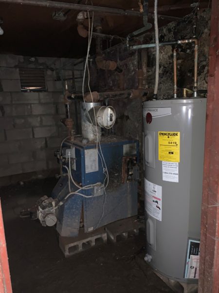 interior water heater of mixed use building for sale by maltz auctions